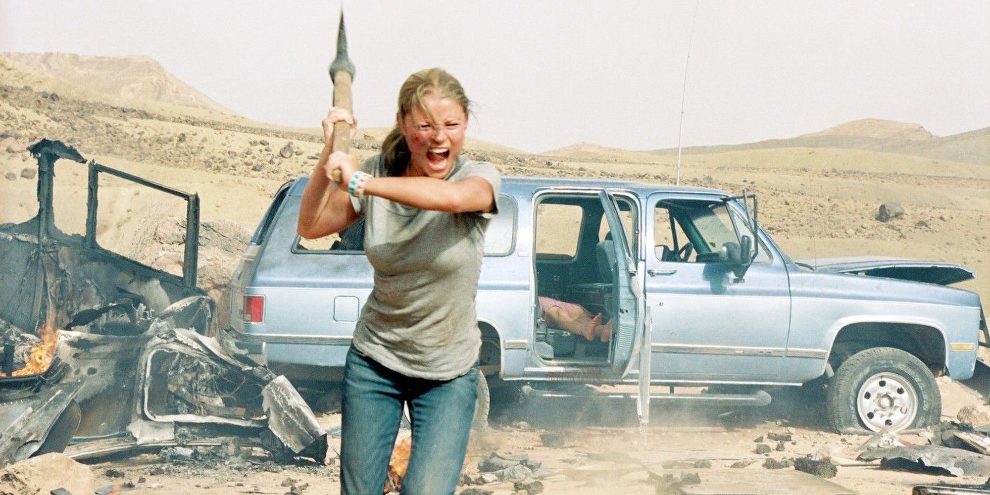 Emilie de Ravin ran with an ax in The Hills Have Eyes