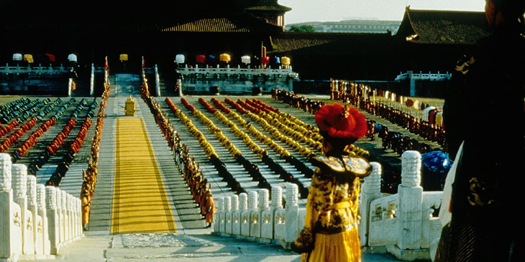 Young Emperor Puyi looking at his soldiers standing in a square in The Last Emperor - 1987