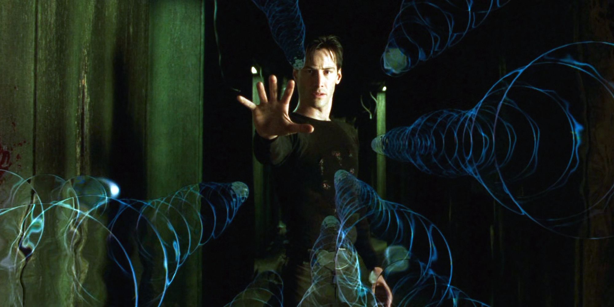 Neo (Keanu Reeves) stopping bullets in 'The Matrix'