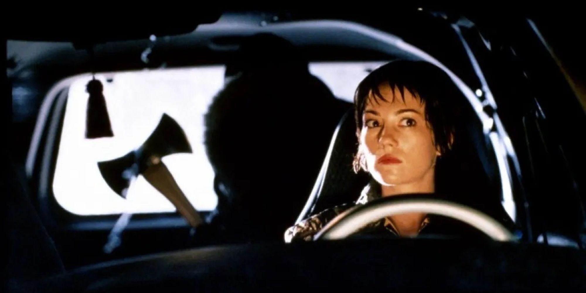 Natasha Gregson Wagner driving while a killer hides in the backseat in Urban Legend