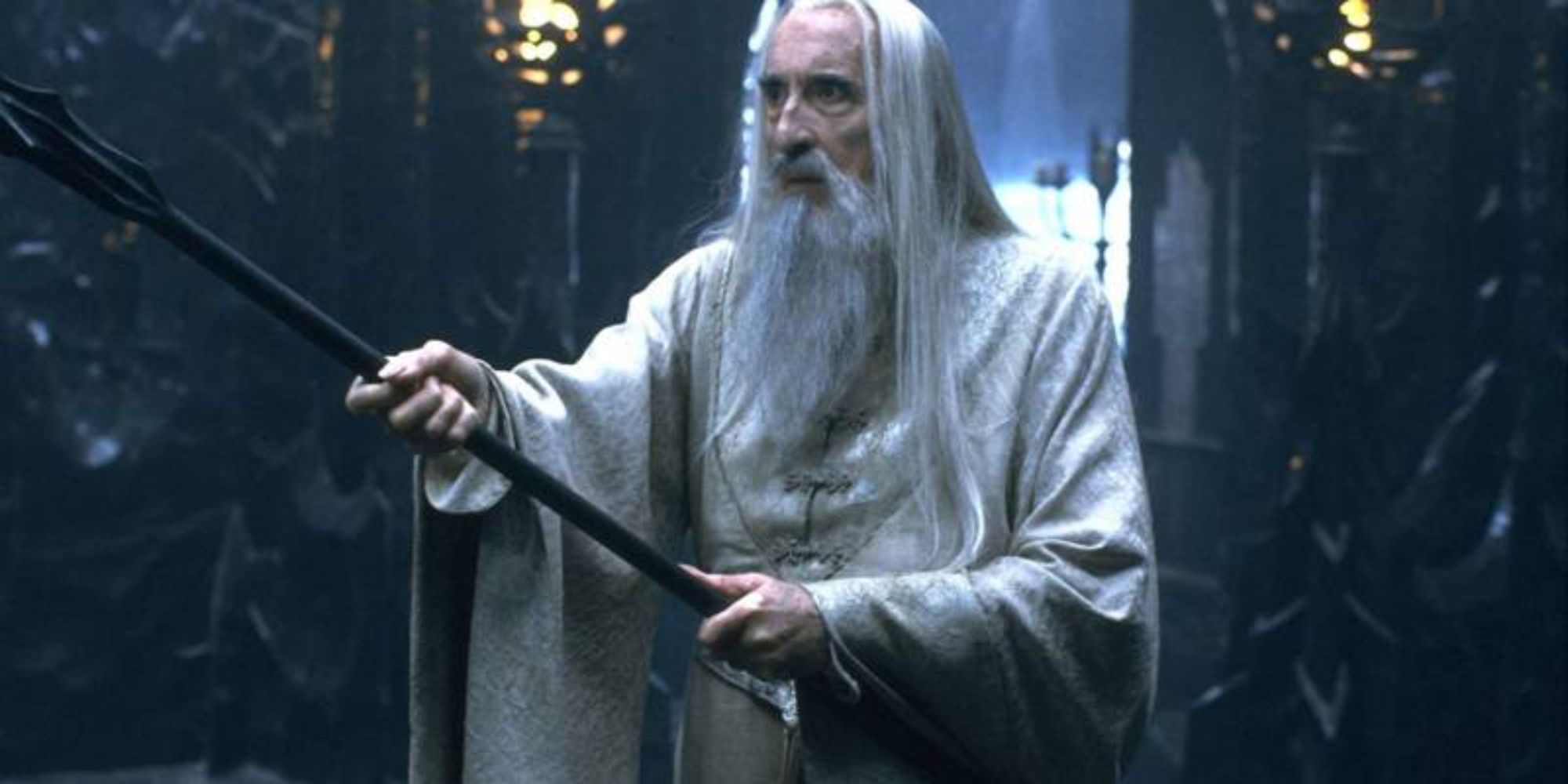 Saruman (Christopher Lee) holding his scepter in Lord of the Rings