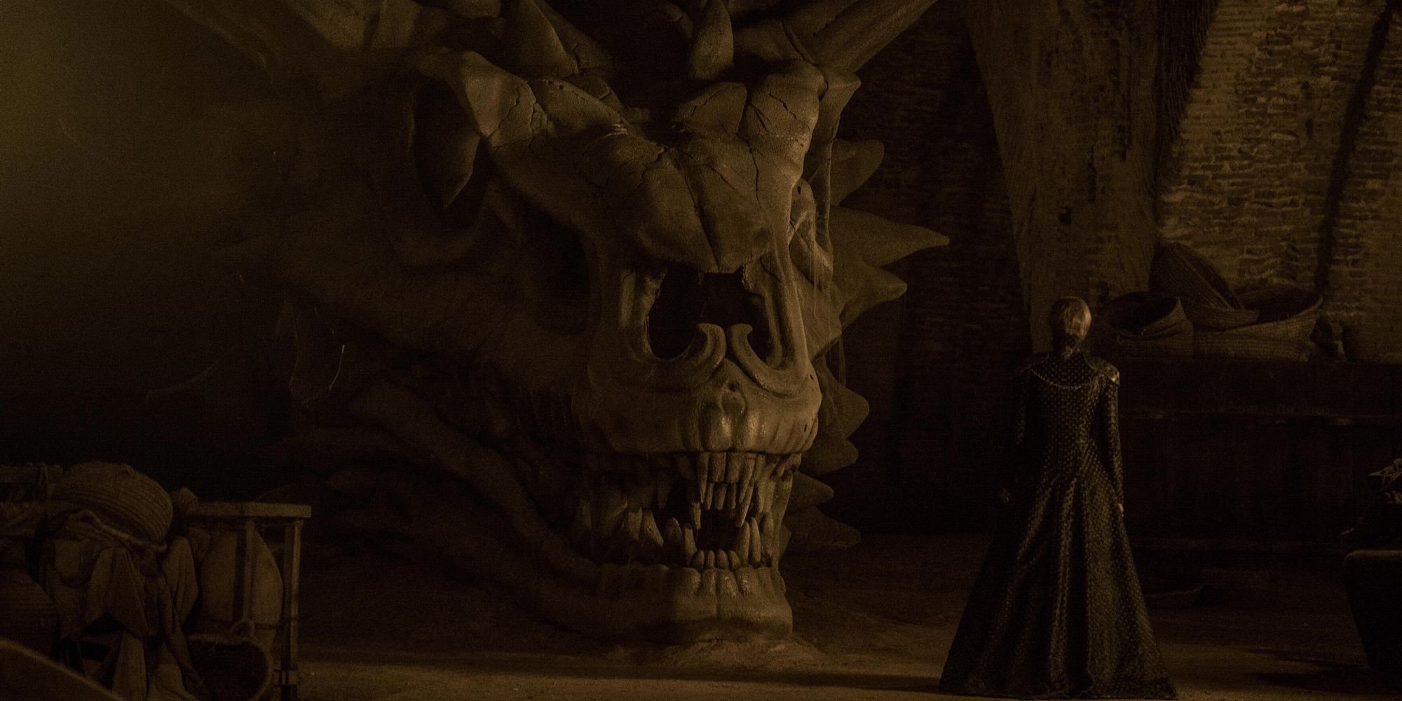 Cersei looking at the skull of Balerion the Dread in 'Game of Thrones'