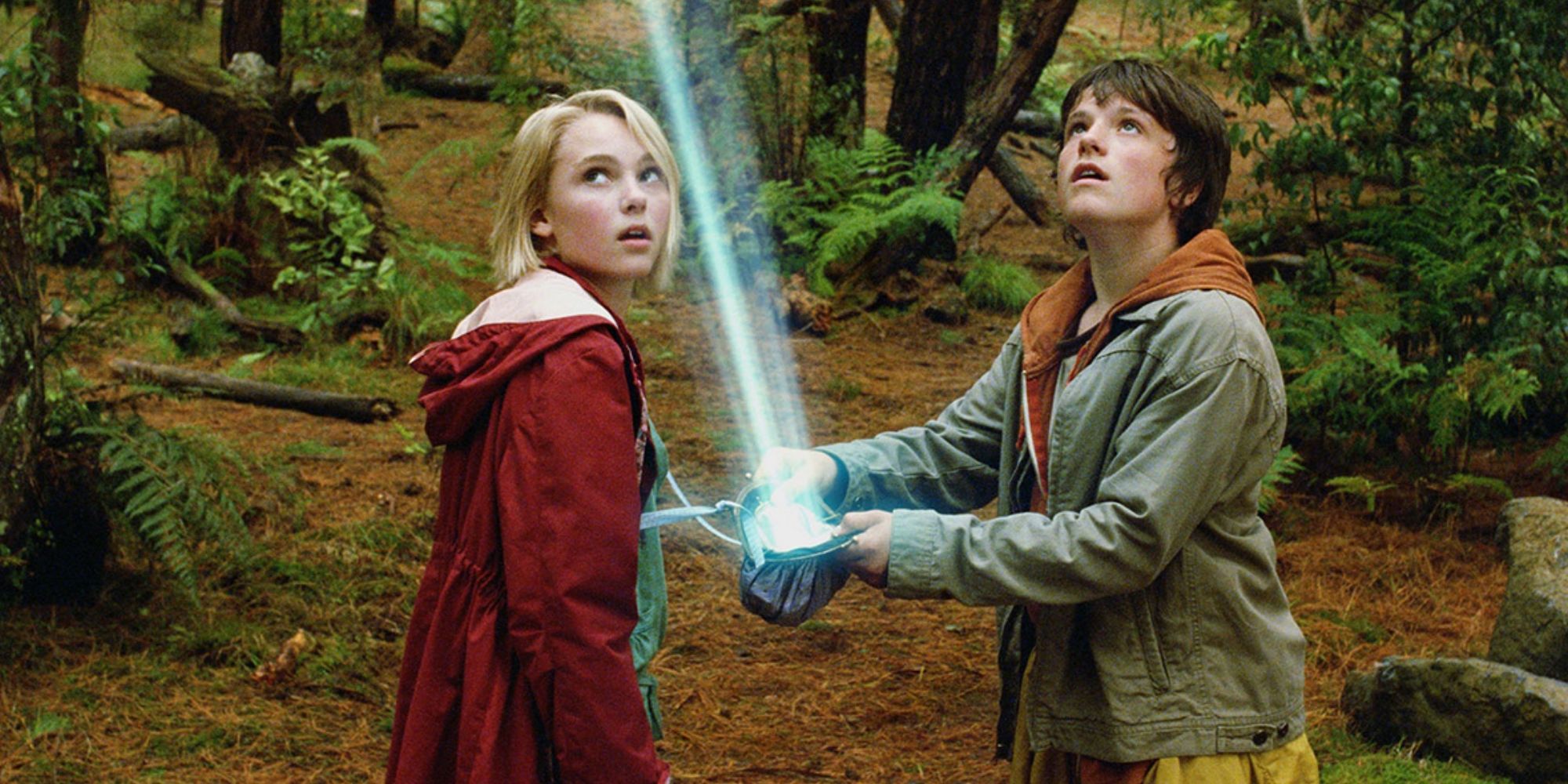 AnnaSophia Robb and Josh Hutcherson in the woods from 'Bridge to Terabithia'