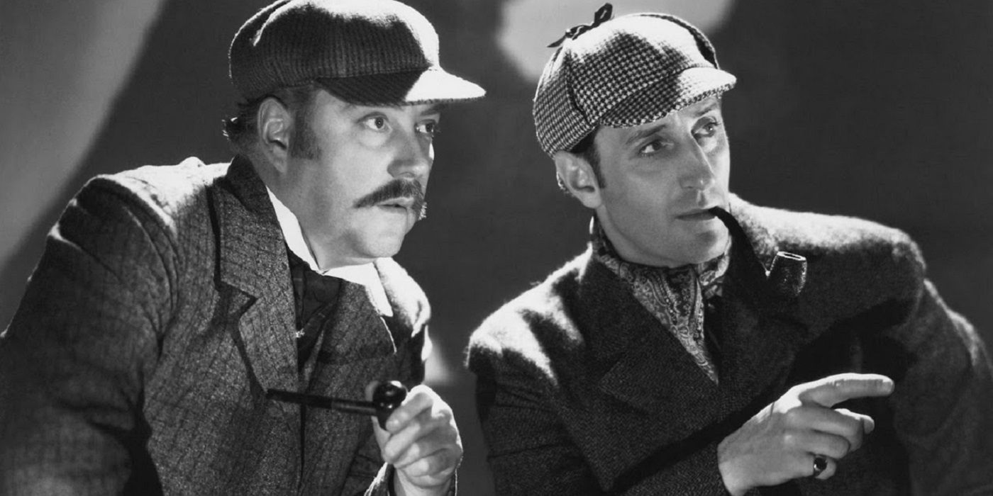 Basil Rathbone & Nigel Bruce as Sherlock Holmes & John Watson in The Hound of the Baskervilles 1939