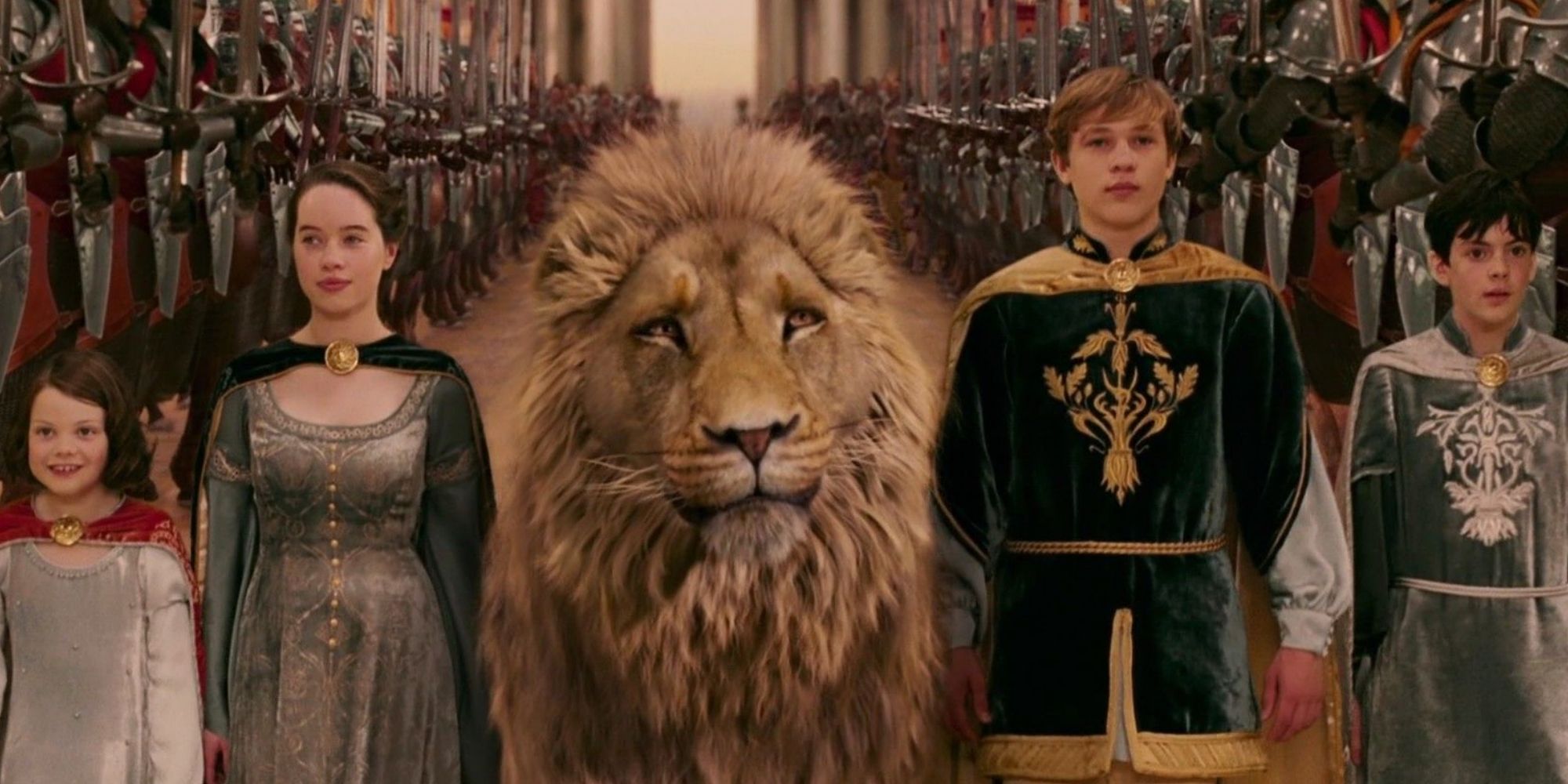 Aslan walking beside Peter, Susan, Edmund and Lucy Pevensie from 'The Chronicles of Narnia: The Lion, The Witch and The Wardrobe' 