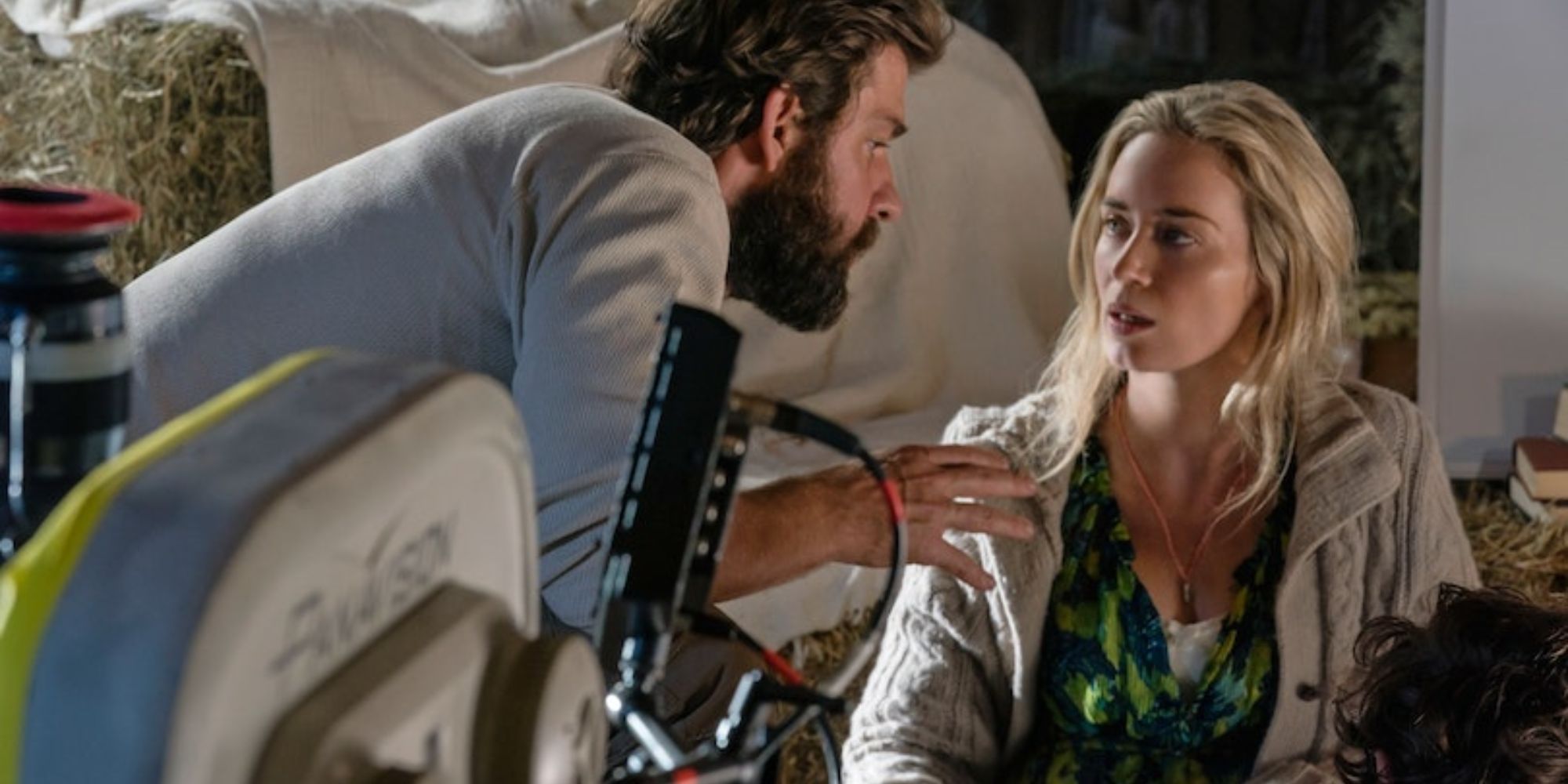 A man giving a woman tips for filmming
