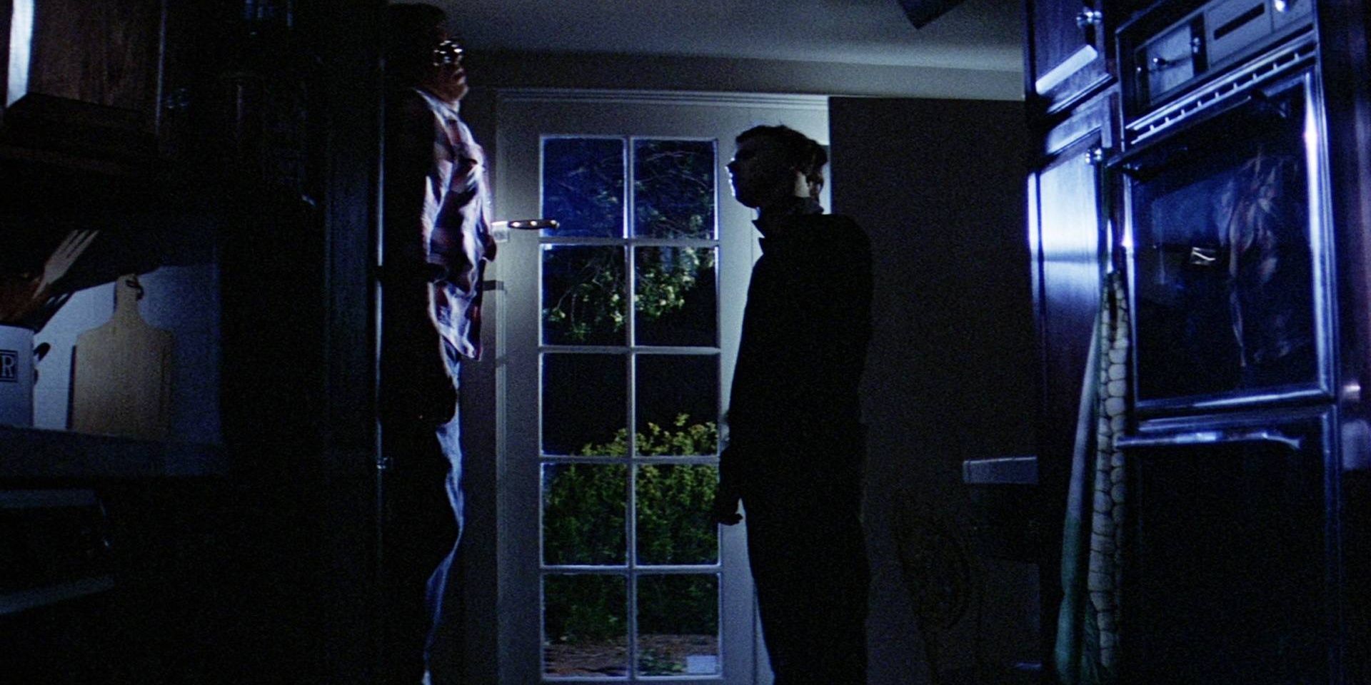 Michael Myers staring at victim in Halloween (1978)