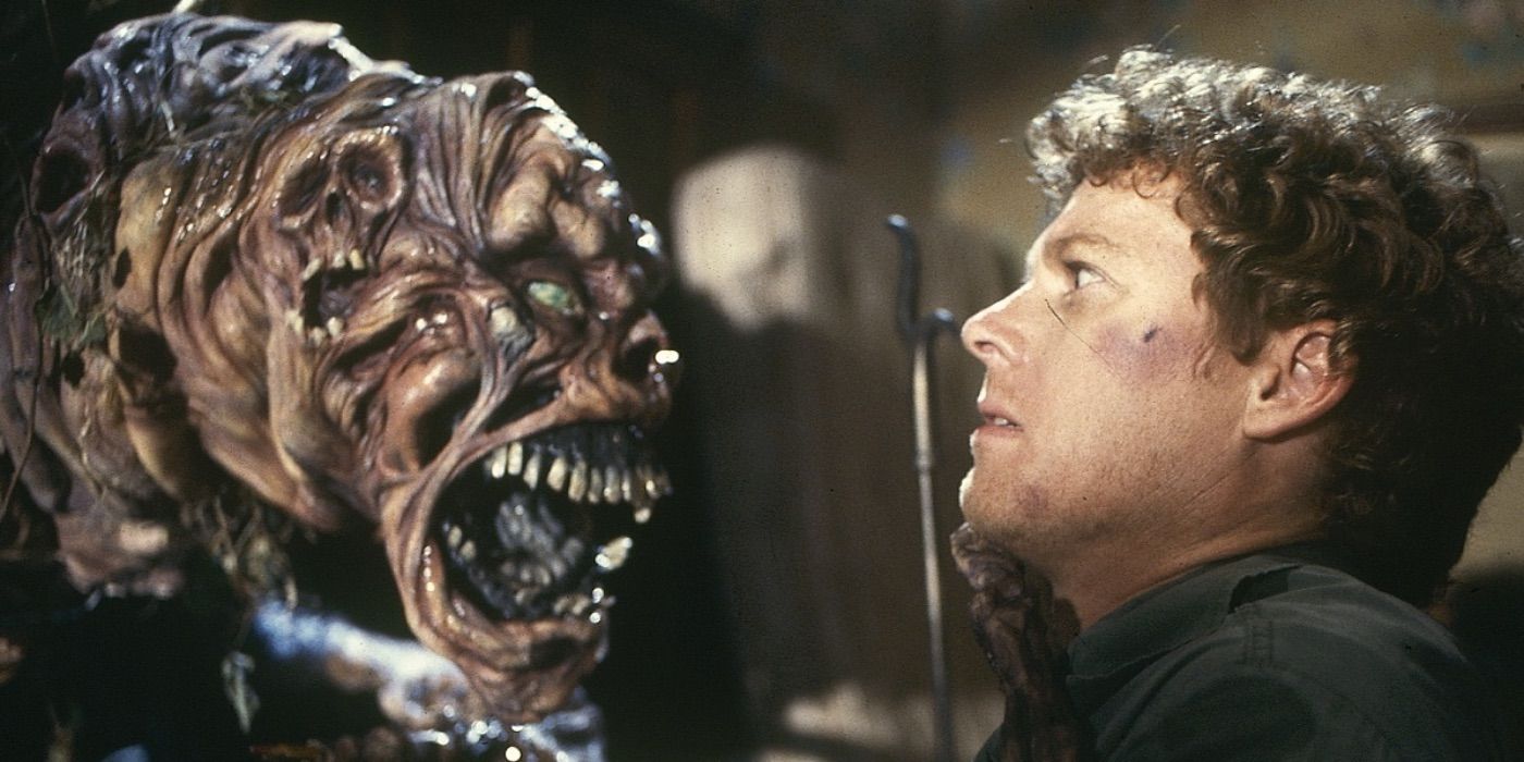 Roger (William Katt) looking in horror at a gruesome monster in House (1986)