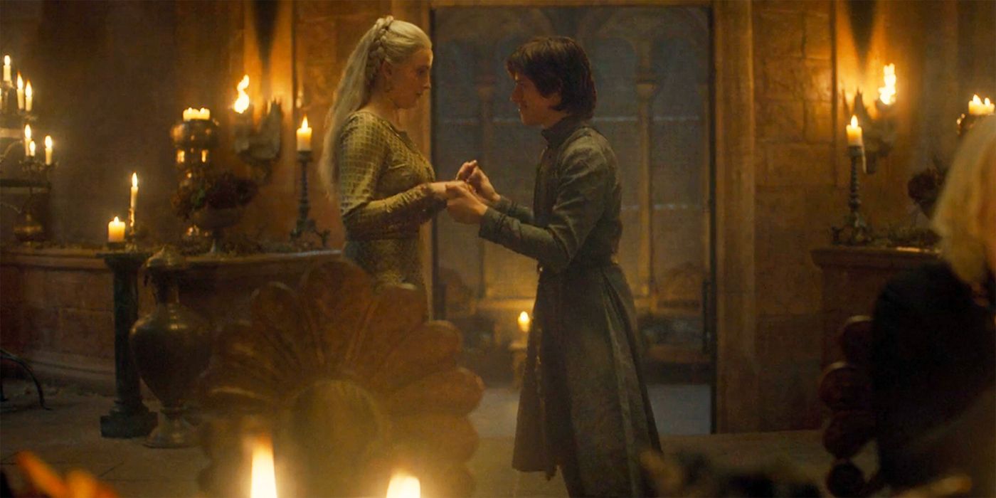Phia Saban as Helaena Targaryen and Harry Collett as Jacaerys Velaryon dancing together in House of the Dragon