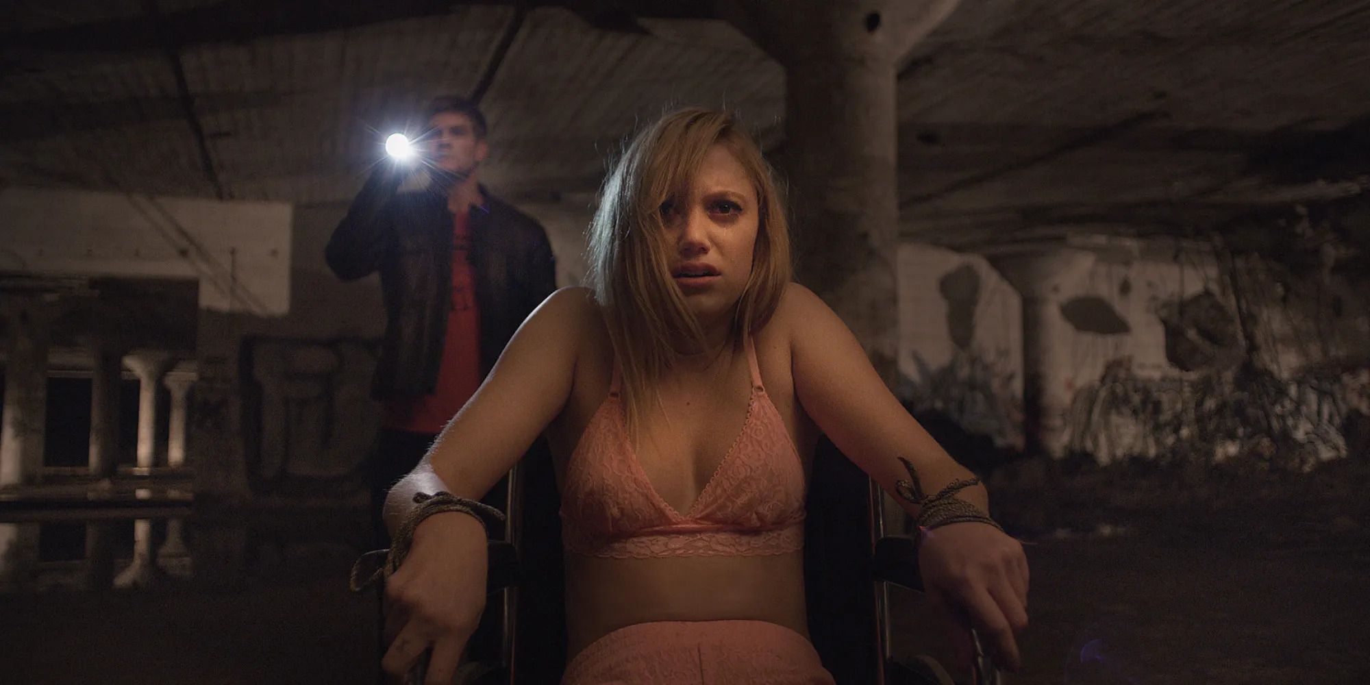 Jay (Maika Monroe) tied to a chair in 'It Follows'