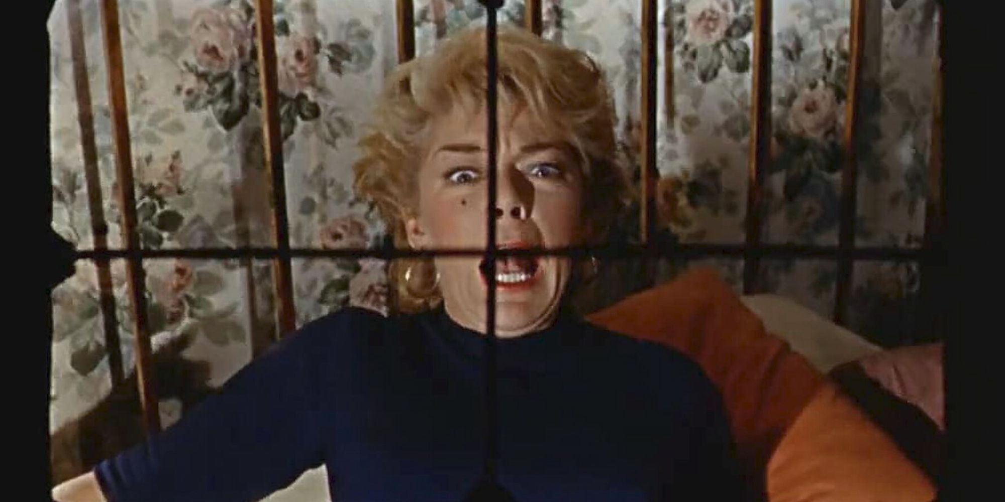 A victim is seen through the camera's lens in 'Peeping Tom'