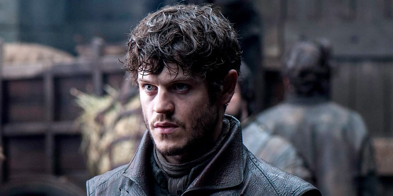 Iwan Rheon as Ramsay Bolton looking intently off-camera in Game of Thrones.