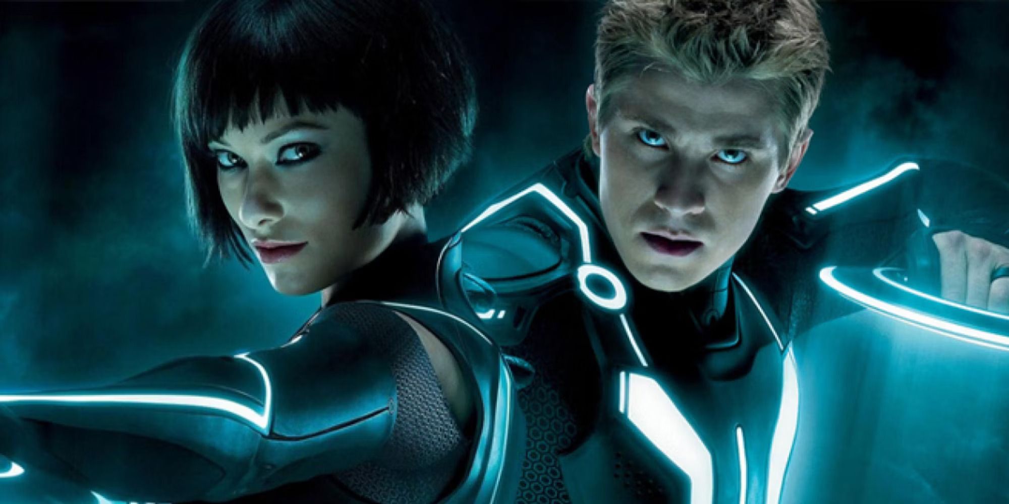 Sam Flynn and Quorra holding identity discs from 'Tron: Legacy'