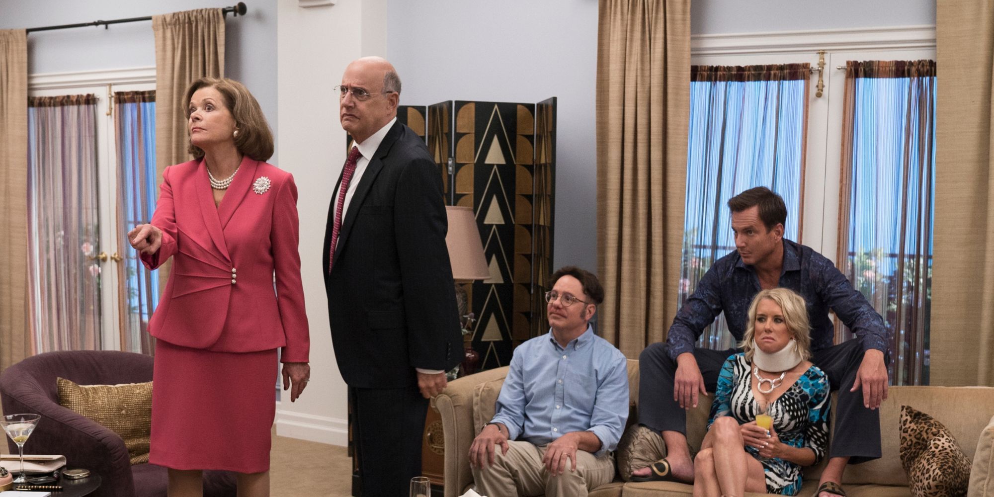 The Bluth family from Arrested Development sitting together