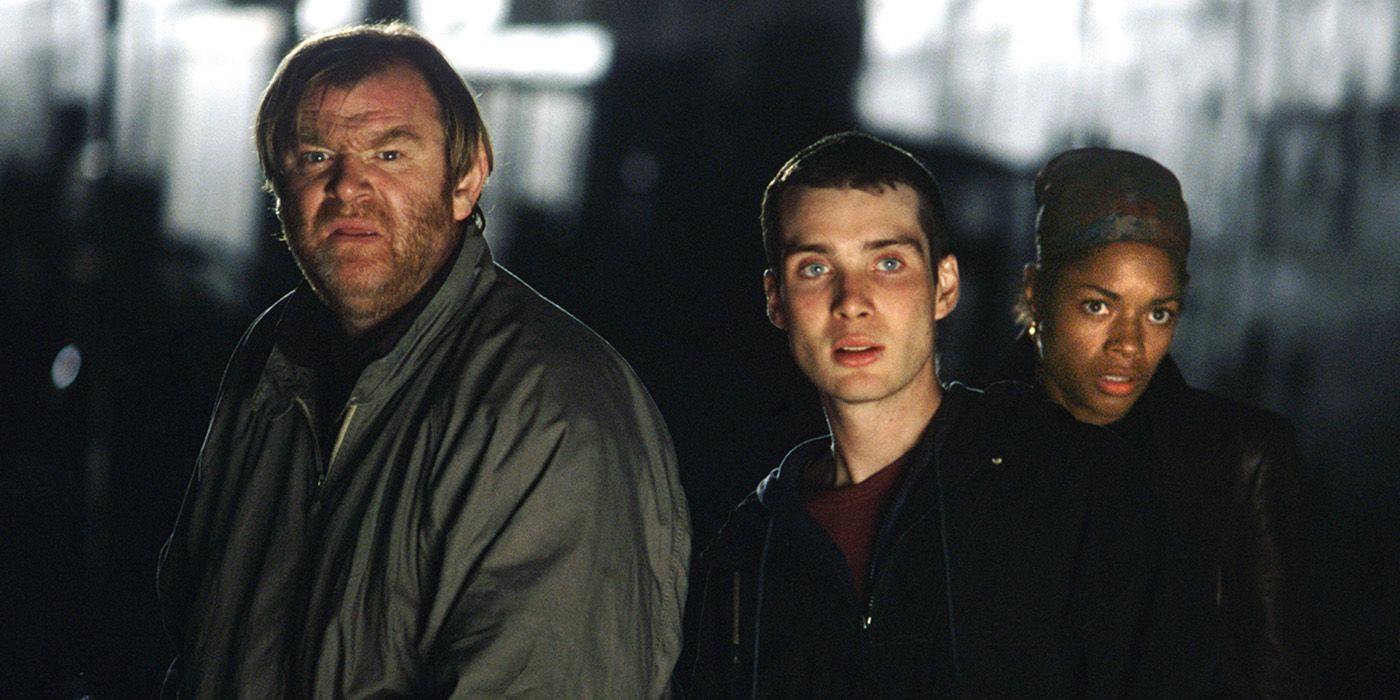 Cillian Murphy, Brendan Gleeson, and Naomie Harris as Jim, Frank, and Selena, standing together in 28 Days Later