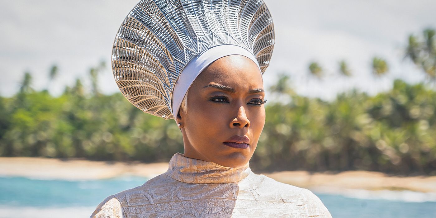Queen Ramonda on a beach looking to the distance in Black Panther: Wakanda Forever.