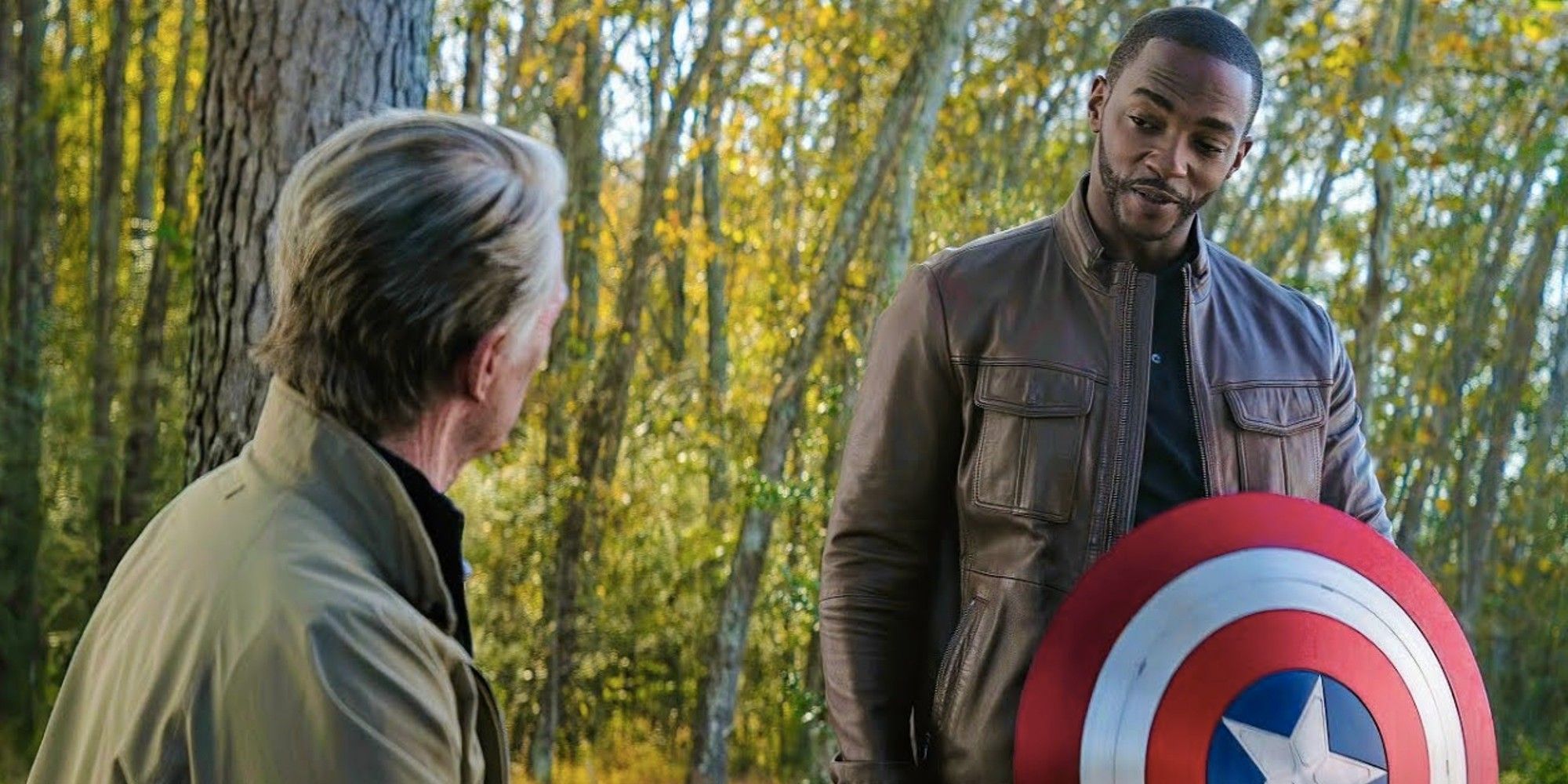 Steve (Chris Evans) talks to Sam (Anthony Mackie) who holds the Captain America shield in Avengers Endgame