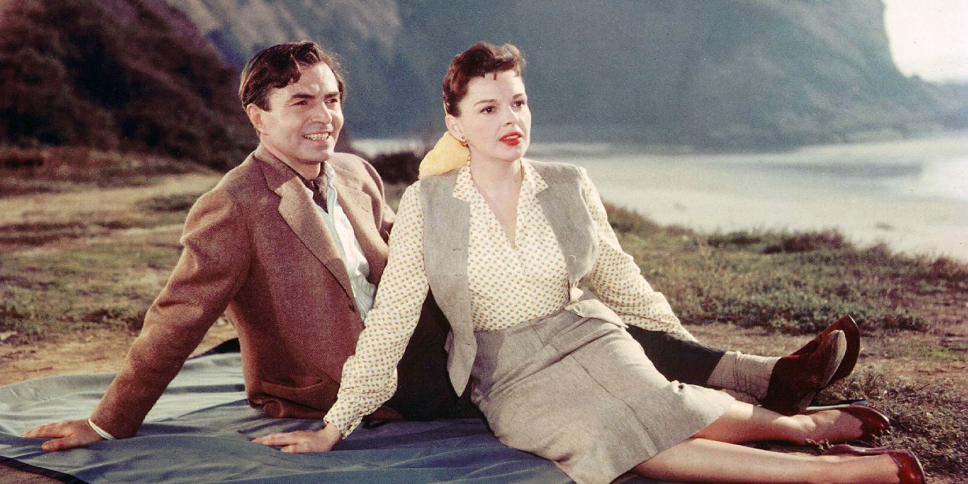 Judy Garland as Esther Hoffman sitting next to James Mason as Norman Maine in A Star is Born (1954)