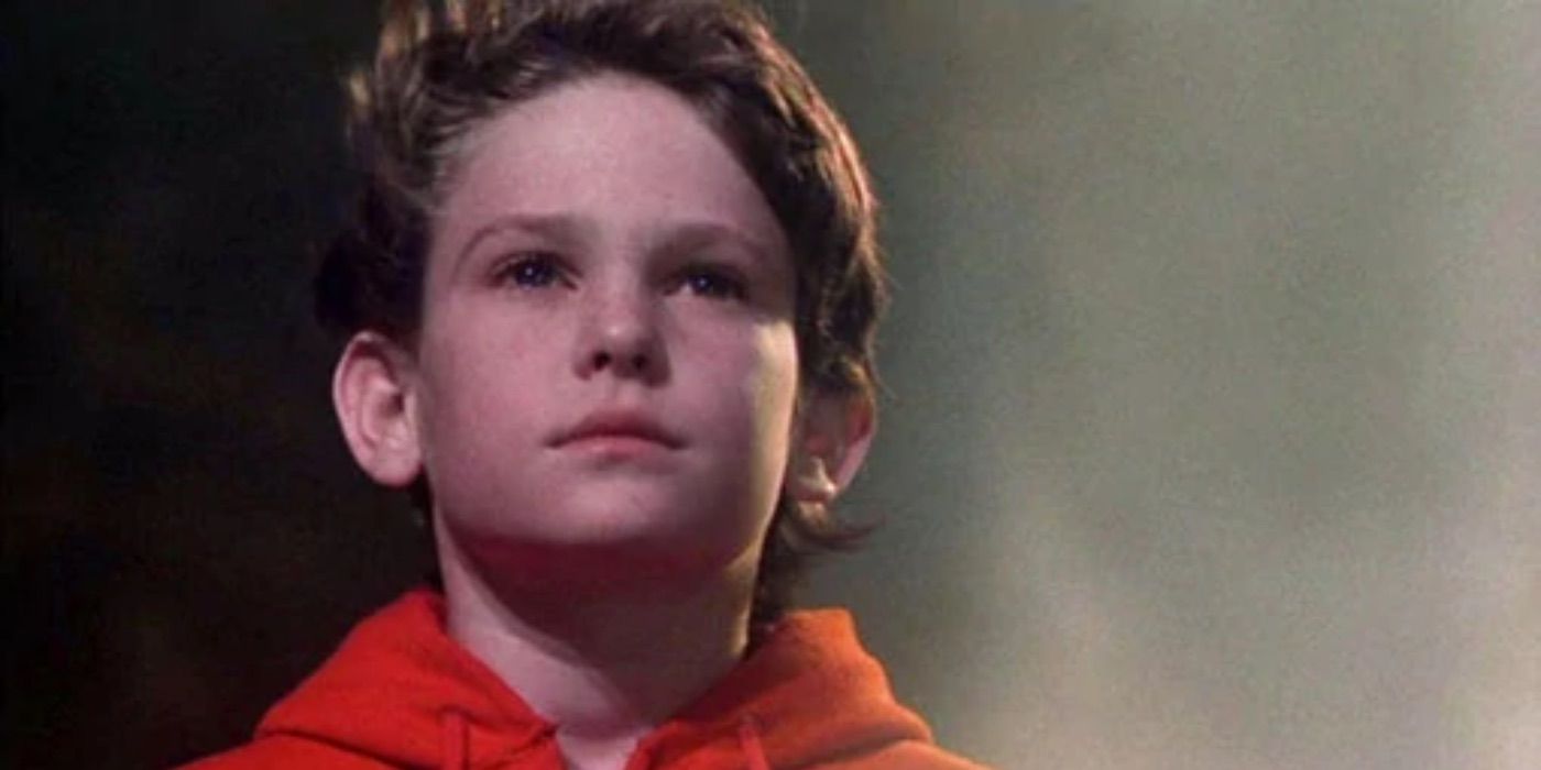 Henry Thomas as Elliot, looking straight ahead in E.T. the Extra-Terrestrial