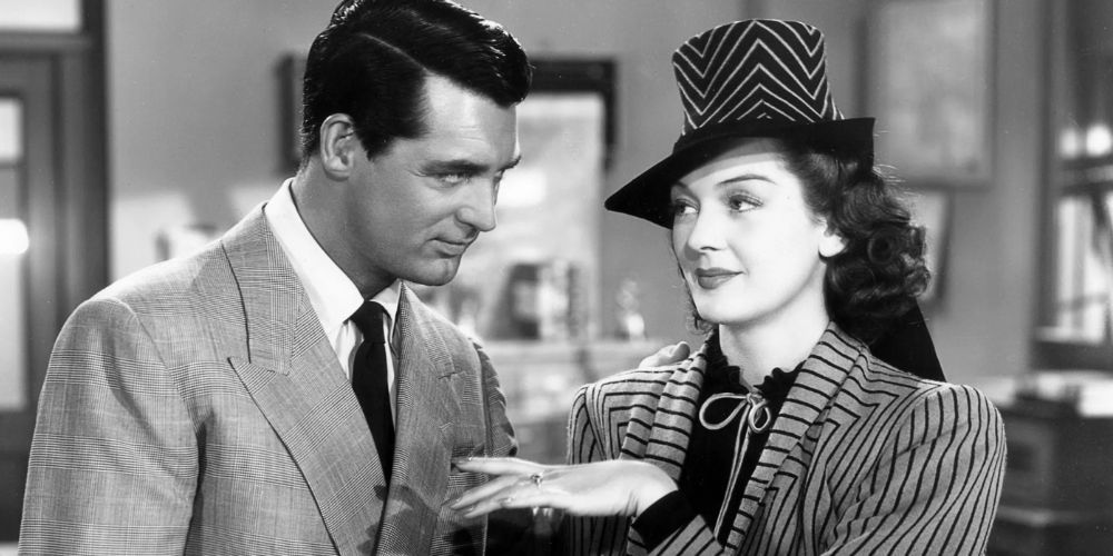 Cary Grant regarde Rosalind Russell dans His Girl Friday