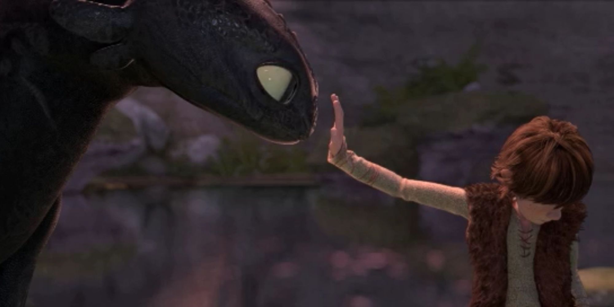 Hiccup reaching out to touch Toothless without looking at him in How to Train Your Dragon