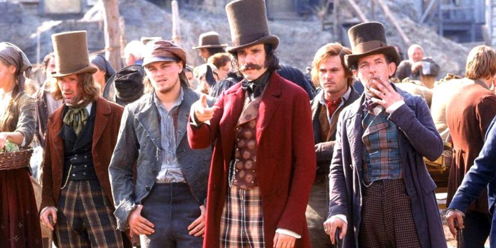 Leonardo DiCaprio standing next to Daniel Day Lewis in Gangs of New York
