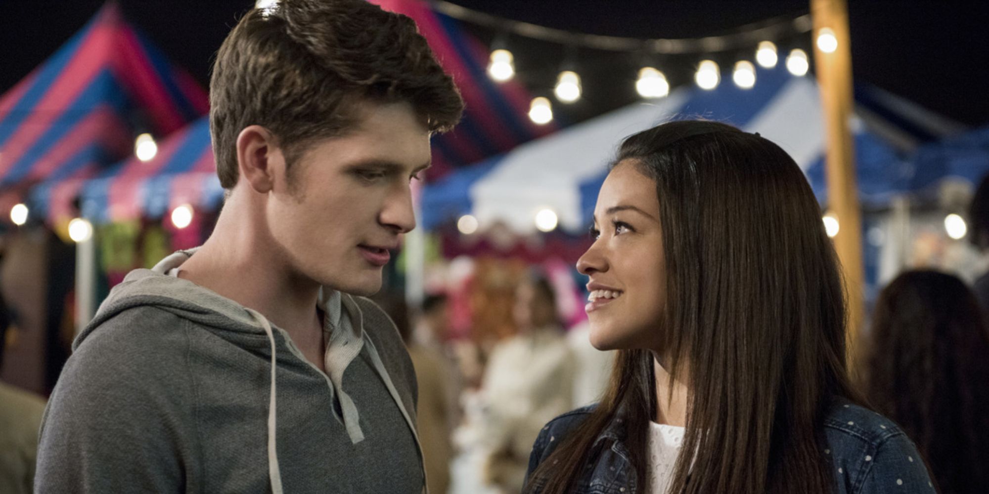 Michael Cordero and Jane Villaneuva from Jane The Virgin standing together