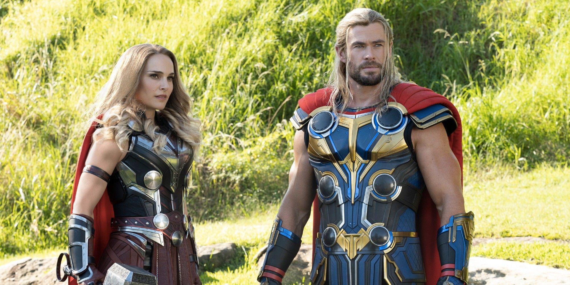 Mighty Thor and Thor standing side by side in 'Thor: Love and Thunder'