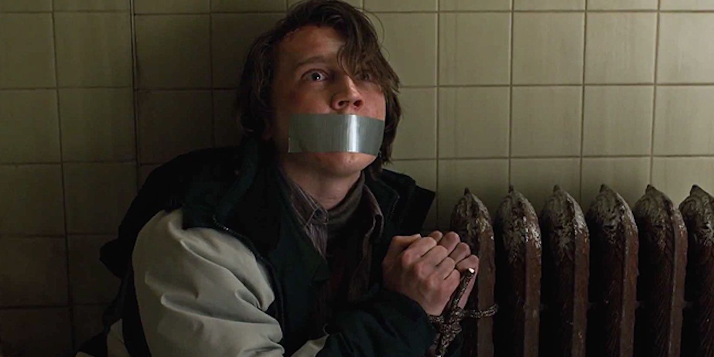 Alex Jones (Paul Dano) handcuffed to a radiator with his mouth taped shut in 'Prisoners'