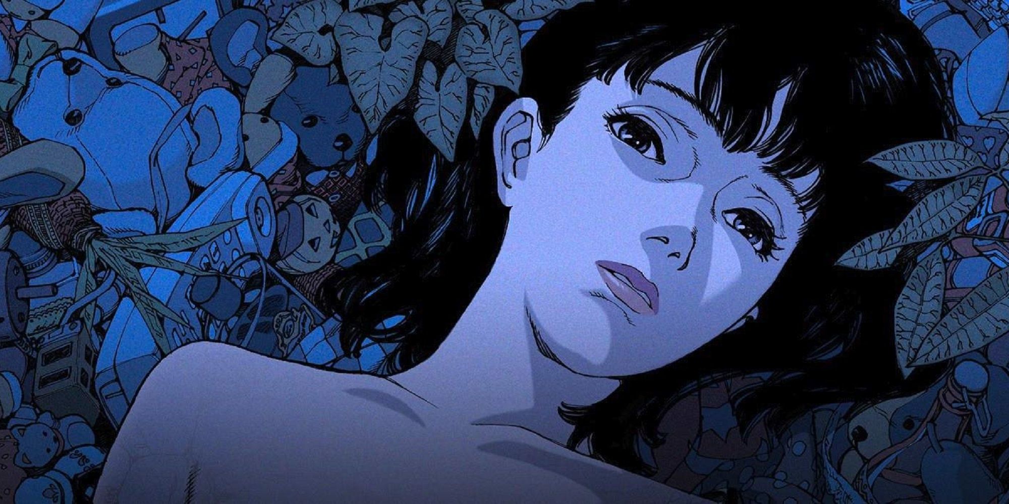 Mima laying in a bed of leaves, toys, and various objects in 'Perfect Blue.'