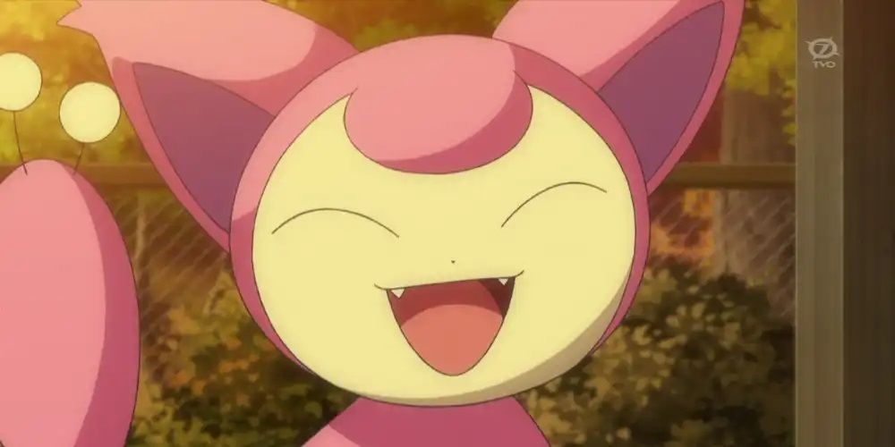 A Skitty smiling wide