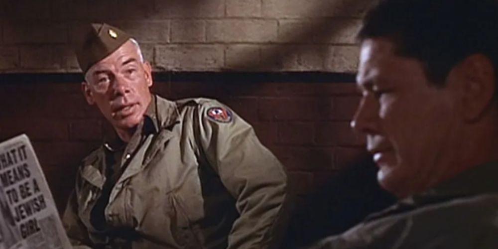 Lee Marvin talking to Charles Bronson in The Dirty Dozen