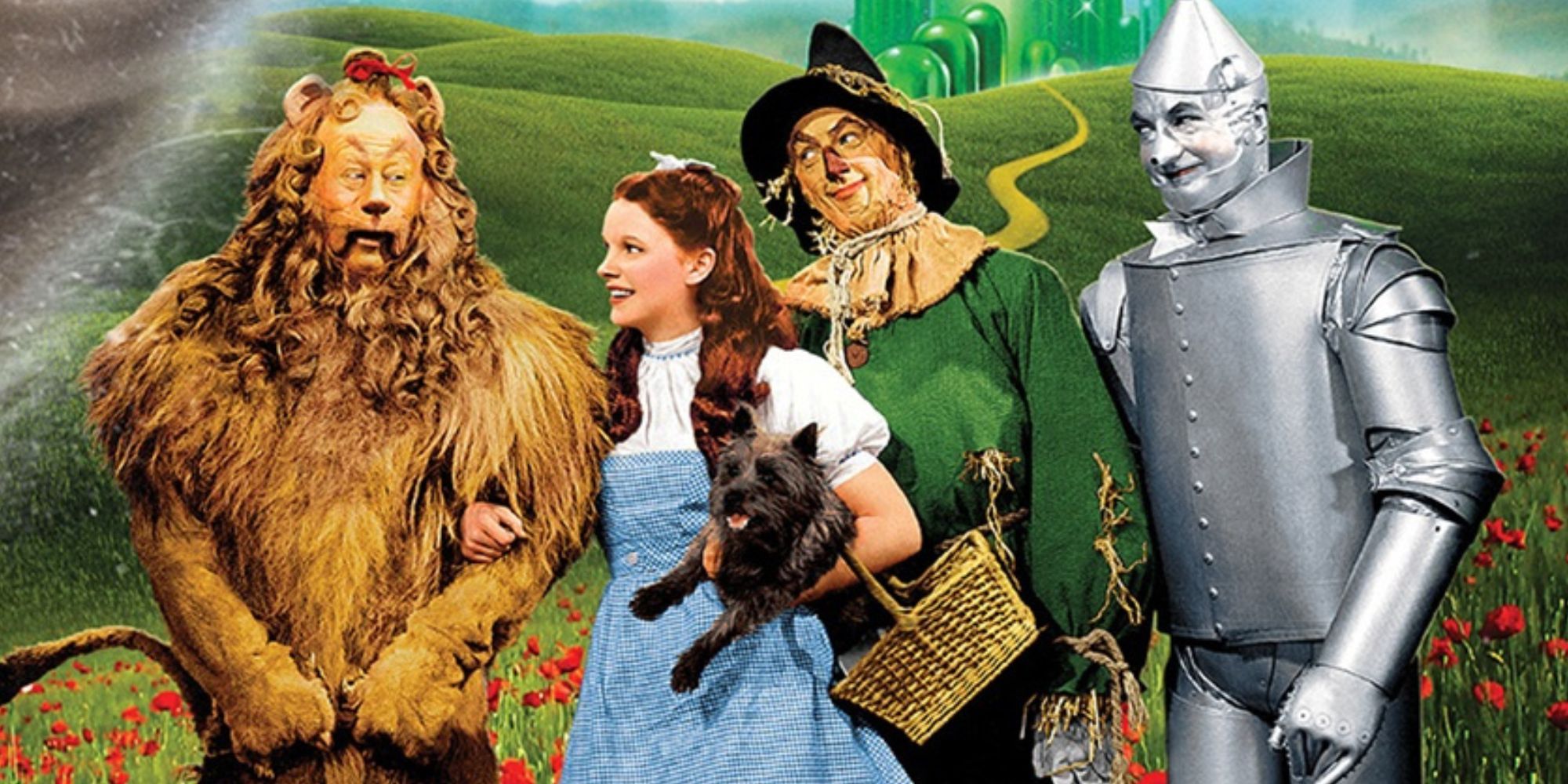 Le lion, Dorothy, l'épouvantail et l'homme de fer blanc sur la route de briques jaunes dans Le Magicien d'Oz.