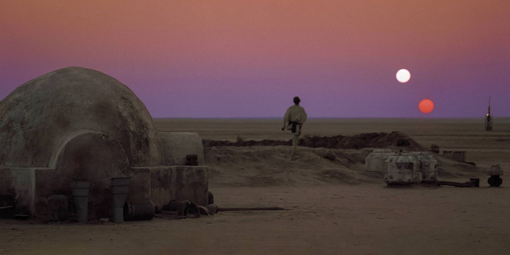In Star Wars, two suns set over the horizon of an alien desert planet