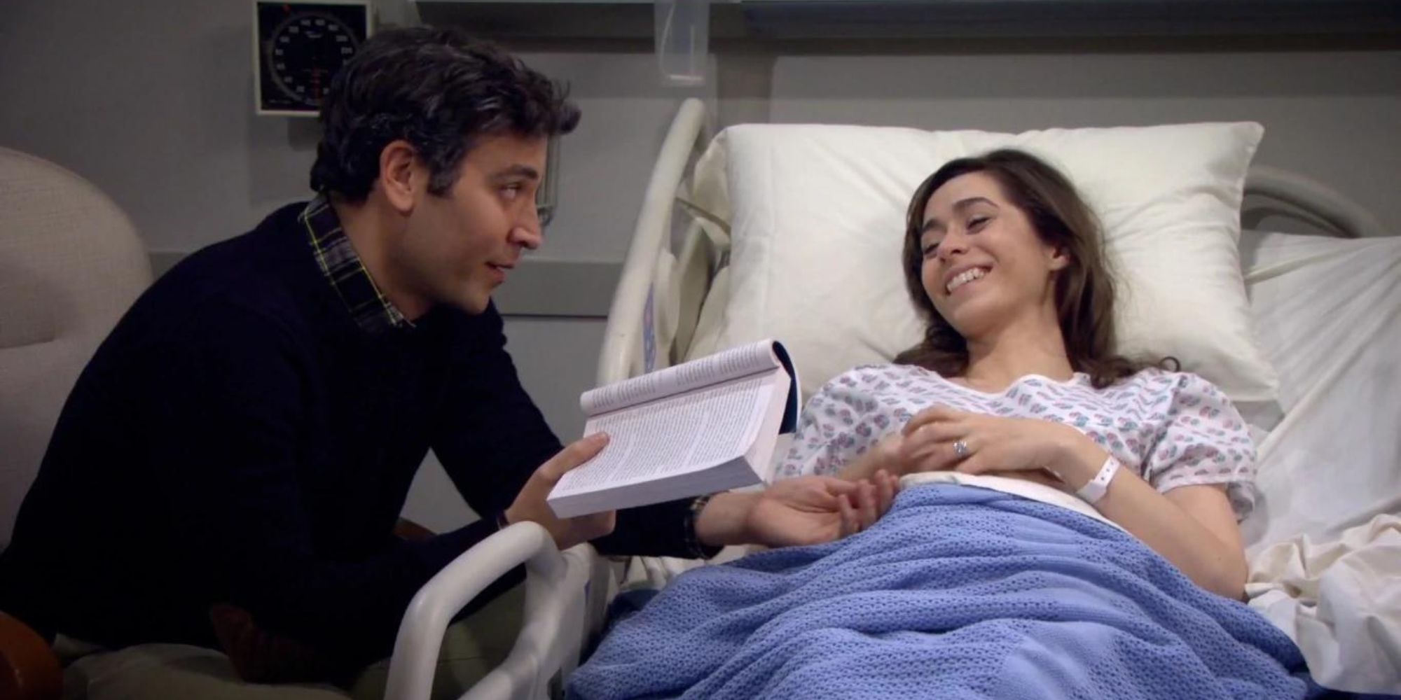 Josh Radnor as Ted reading to Cristin Milioti as Tracy, who is in a hospital bed in How I Met Your Mother.