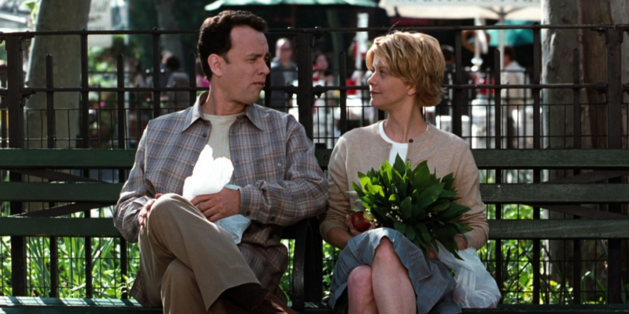 Joe and Kathleen sitting on the park bench in You&rsquo;ve Got Mail