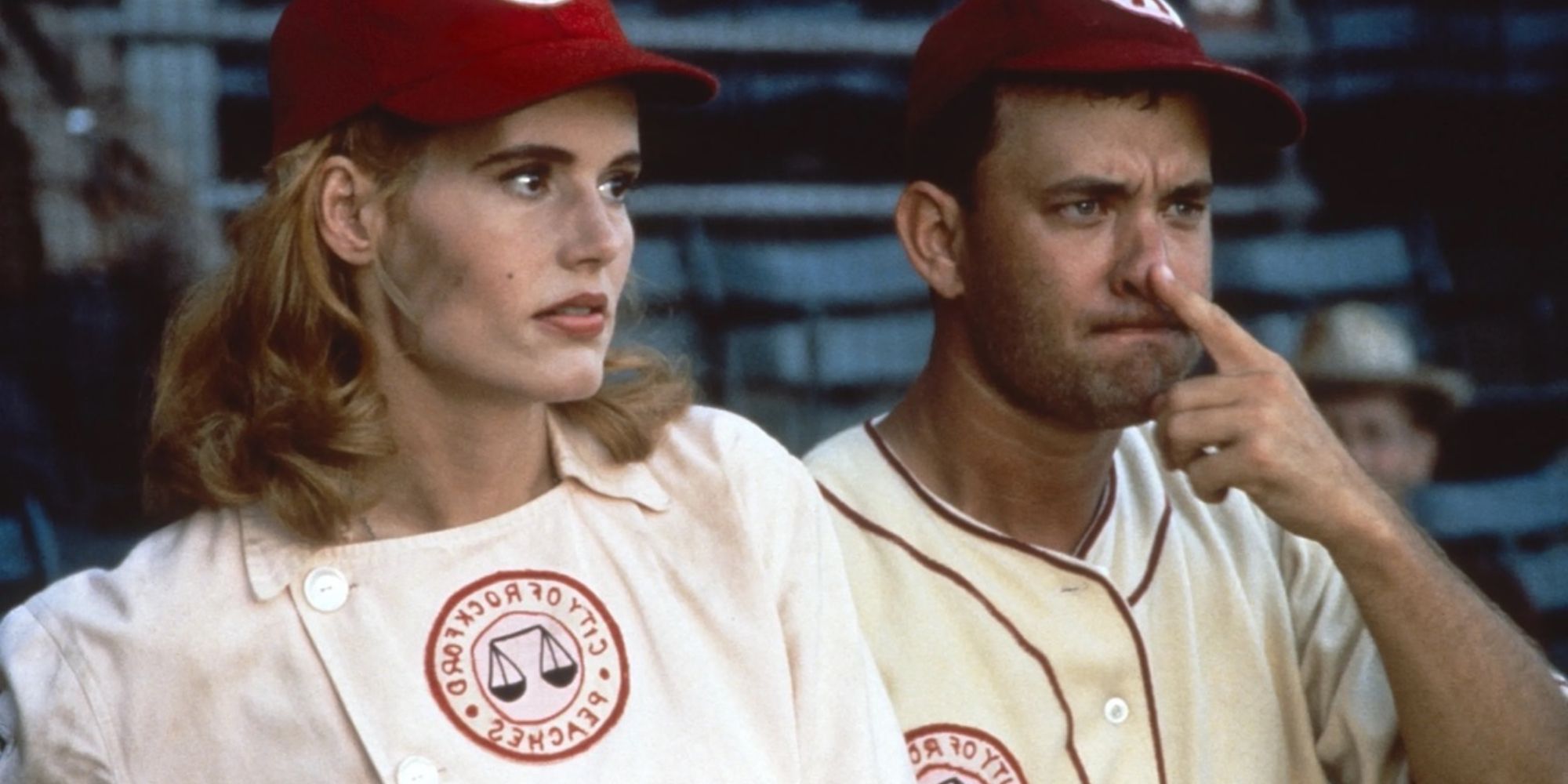 Geena Davis and Tom Hanks stand in the dugout during a scene from the film A League of Their Own