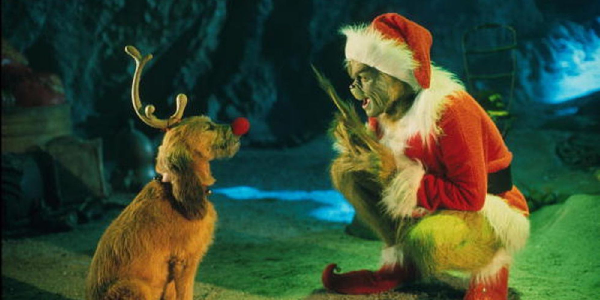 The Grinch (Jim Carrey) directing his dog, Max, in &lsquo;How the Grinch Stole Christmas&rsquo;