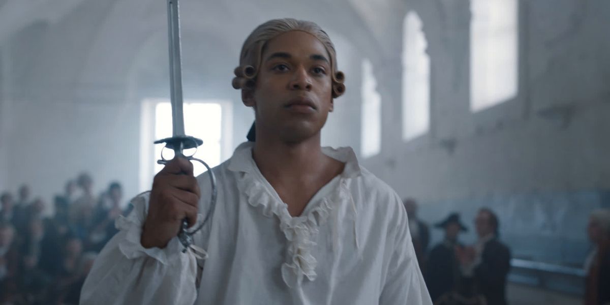 Kelvin Harrison Jr in Chevalier, holding a sword