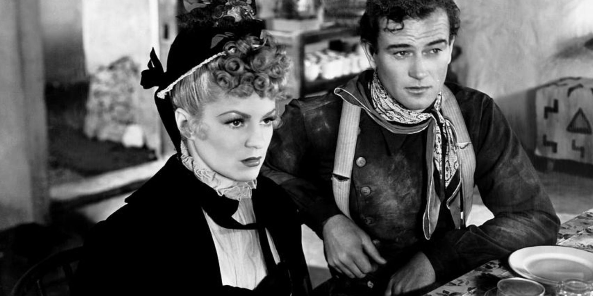 Claire Trevor as Dallas and John Wayne as Ringo Kid in Stagecoach