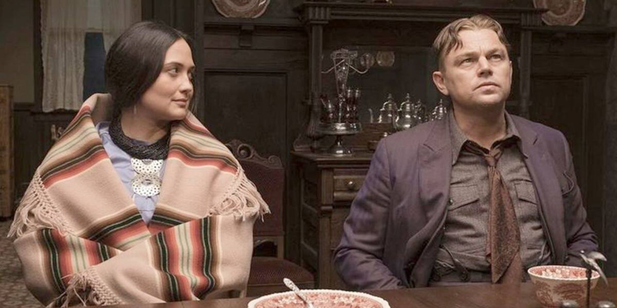 two people sitting by the dining table