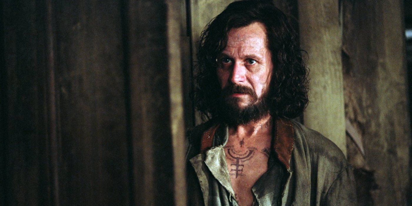 Gary Oldman looking sad and disheveled with a visible chest tattoo in Harry Potter and the Prisoner of Azkaban