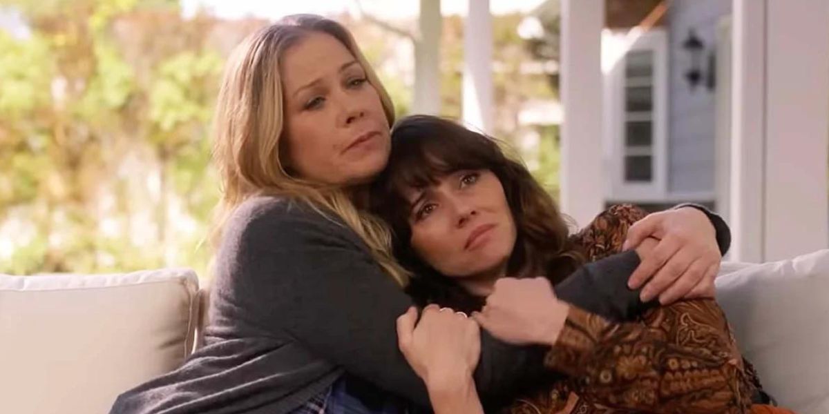 Christina Applegate as Jen and Linda Cardellini as Judy hugging in season 3 of Netflix's Dead to Me