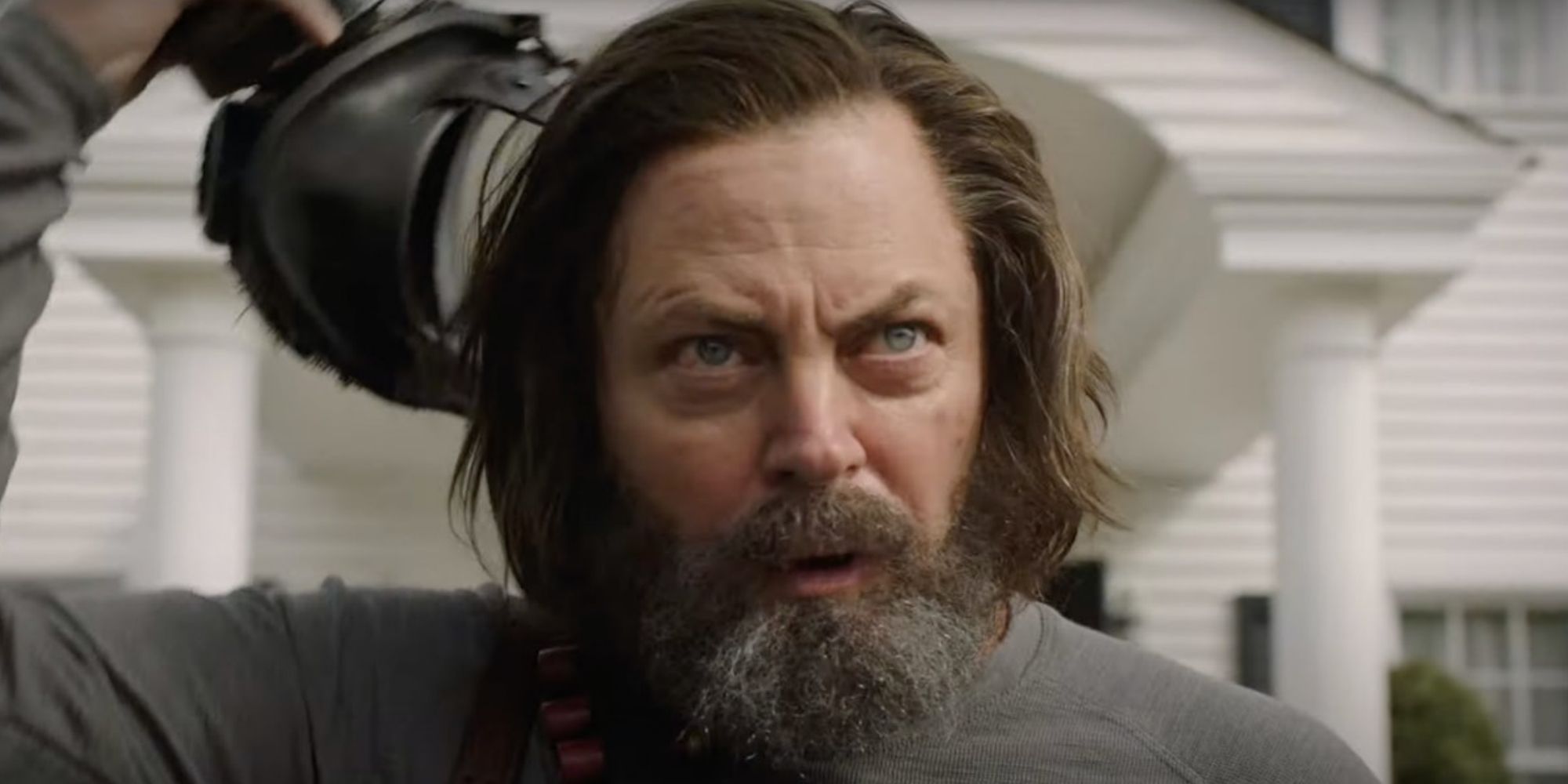 Bill (Nick Offerman) taking off a gas mask in HBO's 'The Last of Us'