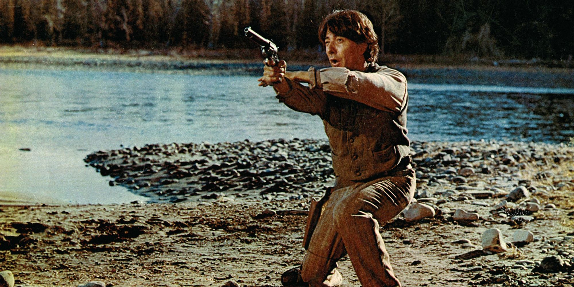 Dustin Hoffman aiming a gun in Little Big Man