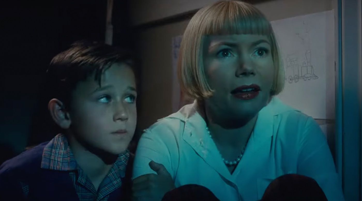Mateo Zoryon Francis-DeFord and Michelle Williams in The Fabelmans 