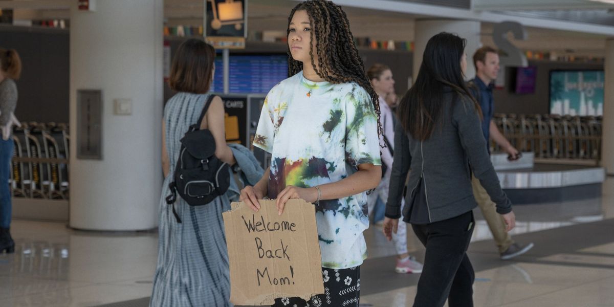 Storm Reid, as June, waits for her mother at the airport, Missing