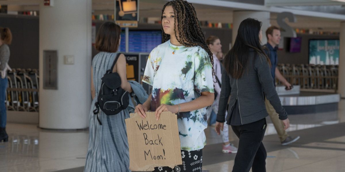 Storm Reid as June, waiting for her mother at the airport, in Missing