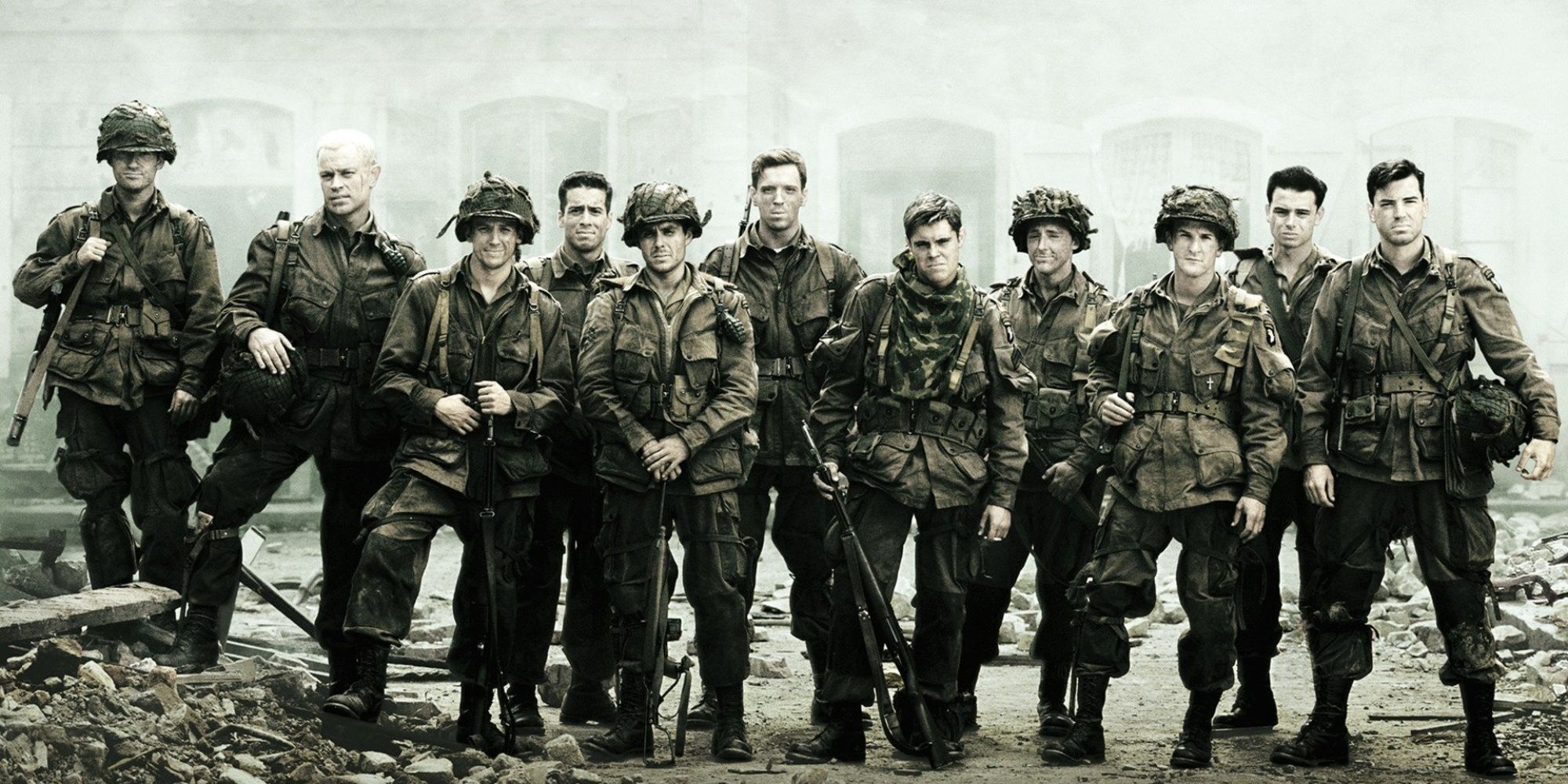 a band of soldiers posing for a picture in the HBO miniseries Band Of Brothers.