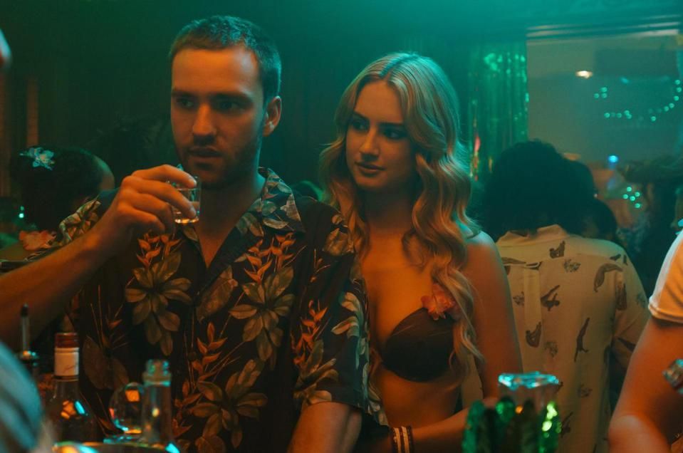 grace van patten and jackson white drinking at a party in tell me lies